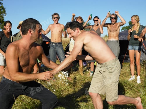 Preview: Men fighting, supporting crowd