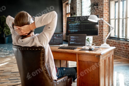 Preview: Programmer working with program code