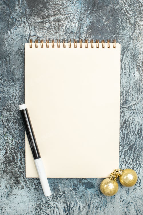 Preview: top view open notepad on a grey background photo copybook school color new year