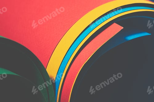 Preview: Multi-colored paper rolled up close-up