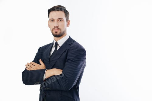 Man in Suit Posing with Arms Crossed