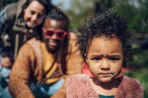 Preview: Multiracial family having fun in the park