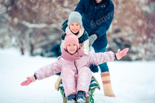Preview: Family of dad and kids vacation on Christmas eve outdoors