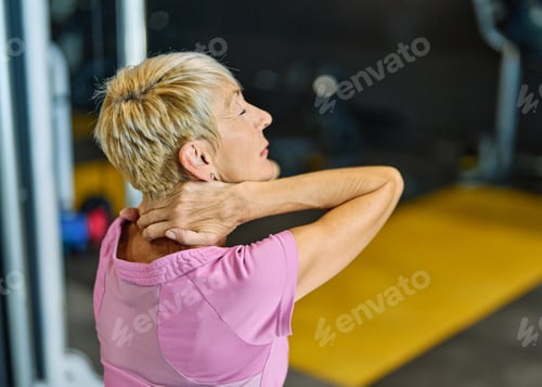 Preview: Senior people exercising in the gym