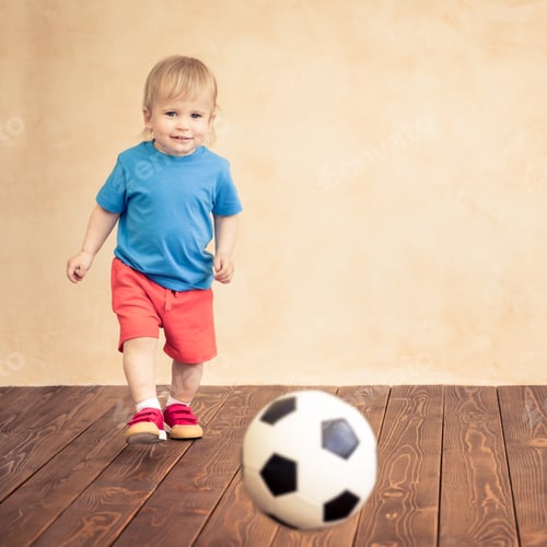 Vista previa: Child is pretending to be a soccer player
