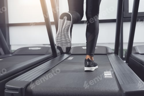 Preview: Legs woman running on treadmill