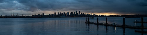 Preview: Panoramic view of Downtown City Skyline during a striking and dramatic sunset