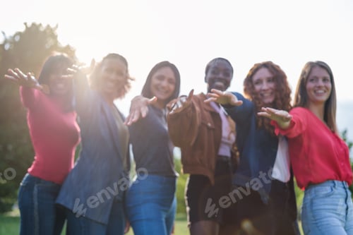 Preview: Group of young women from different origins celebrating female empowerment together
