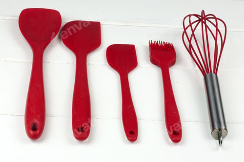 Preview: Closeup shot of red kitchen utensi