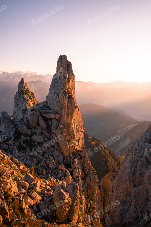Preview: Summer landscape view of the Pierre Avoi side peaks illuminated by the low-angled sun