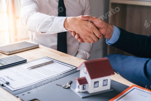 Preview: Discussion With A Real Estate Agent, a businesswoman handshake after signing a contract for Insuranc