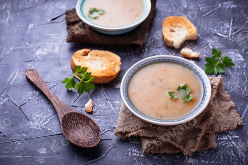 Preview: Healthy vegetarian peas soup on concrete background