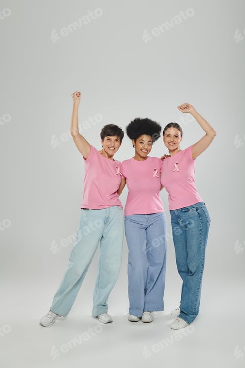 Preview: breast cancer awareness, excited interracial women on grey, different generations, cancer free