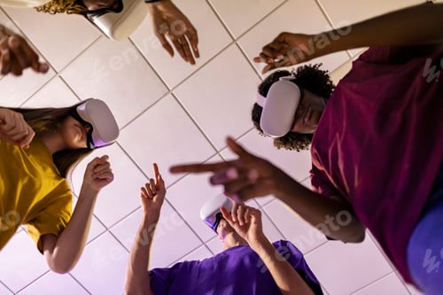 Preview: low angle shot gamers playing with virtual reality glasses