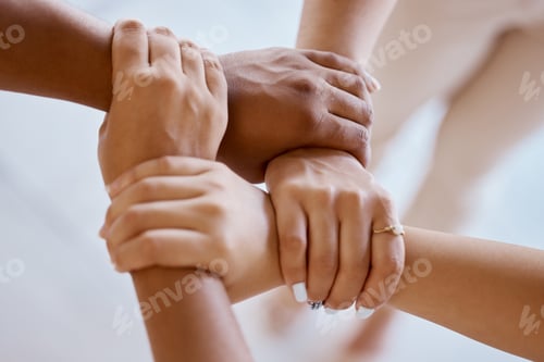 Preview: Hands, together and solidarity with a group of people strong in unity from above for teamwork or co