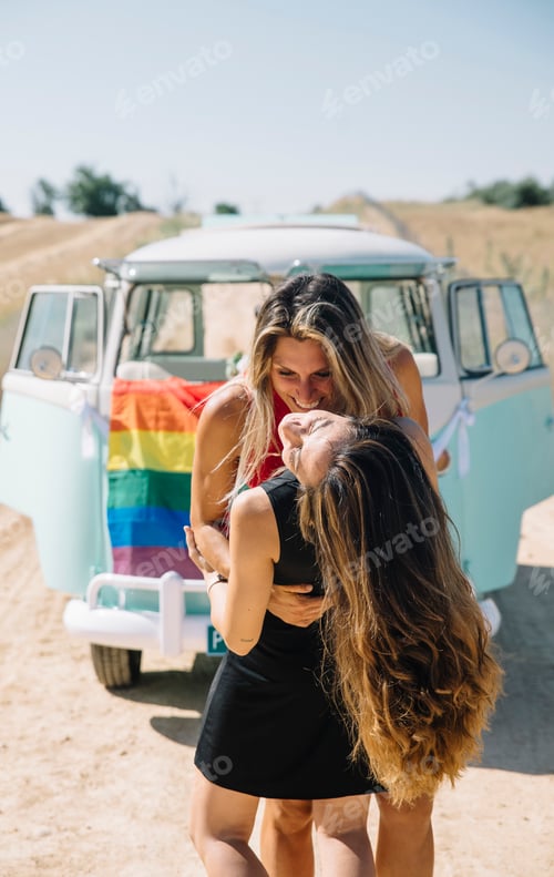 Preview: Two happy lesbian women in the old van