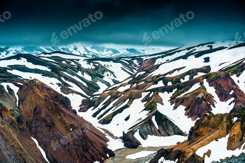 Preview: Volcanic mountain with snow covered at Blahnjukur trail in Icelandic Highlands