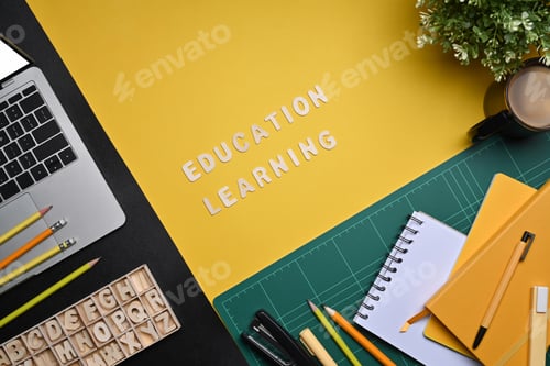 Preview: Computer laptop and stationery on yellow background. Back to school concept.