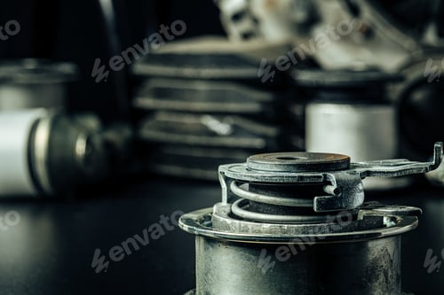 Preview: Close up of new car parts on black background