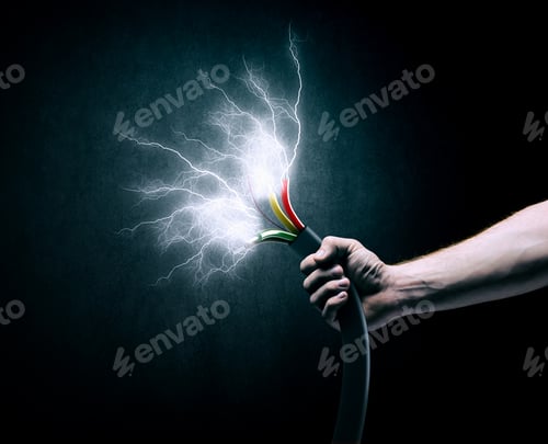 Preview: Close Up Image Of Human Hand Holding Cable