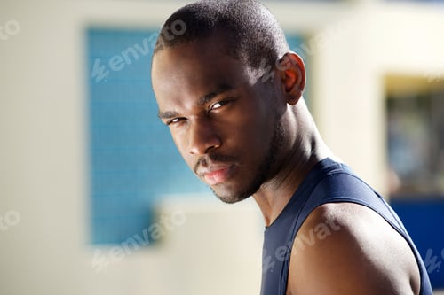 Preview: Close up side of handsome young african american male sports model