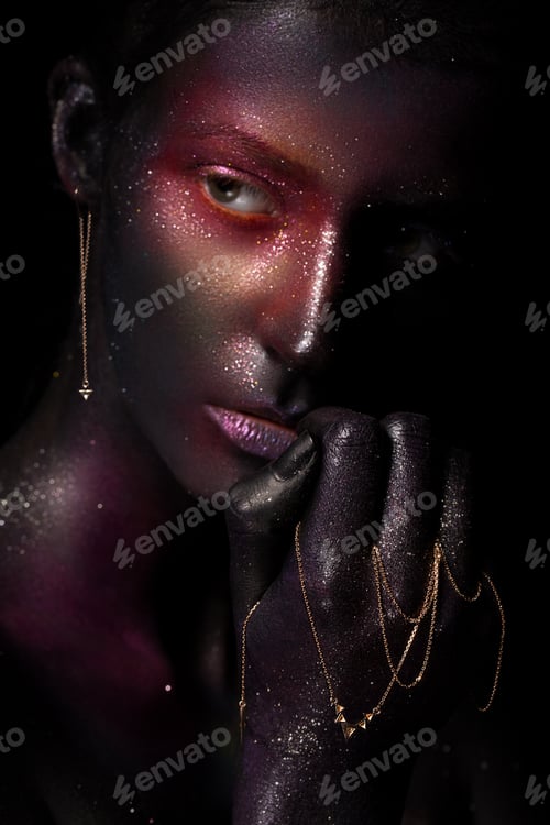 Preview: Beautiful girl with art space makeup on her face and body. Glitter Face.