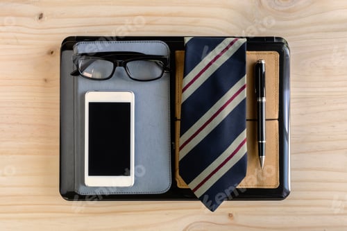 Preview: Businessman accessories and notebook bag on desk
