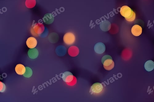 Preview: Abstract bokeh of blurred horizontal background of multicolored Christmas lights