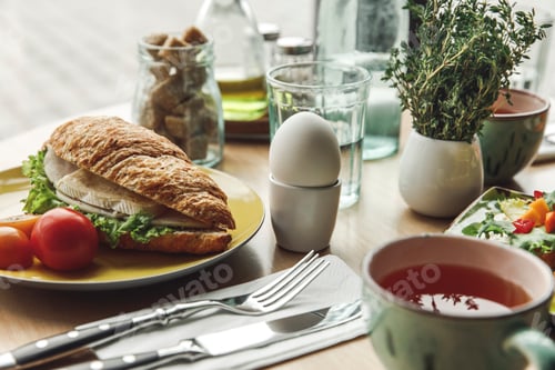 Preview: close-up view of delicious healthy breakfast served on table