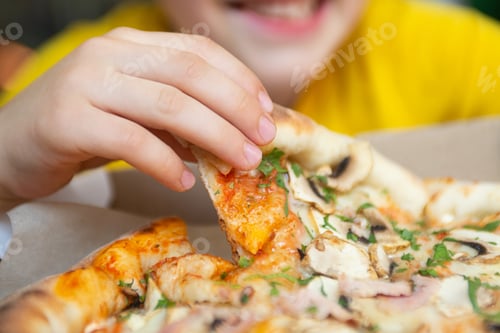 Preview: Closeup photography of child eating slice of pizza.