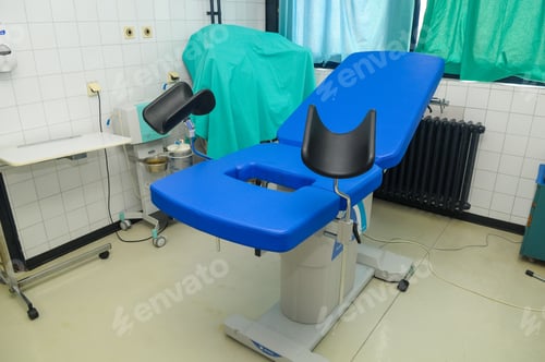 Preview: Interior of medical room with blue gynecological chair