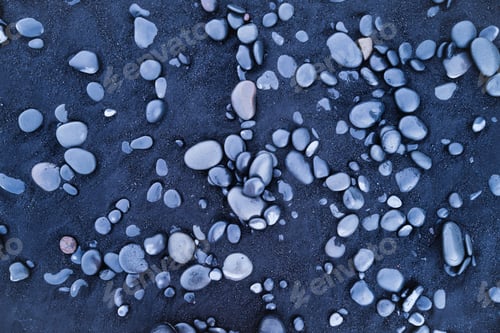 Preview: Gray pebbles as a background. Round stones on the beach. Photography for design.