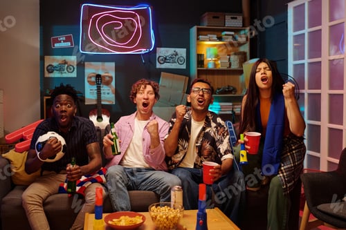 Preview: Multiethnic Young Adults Expressing Excitement While Watching Live Soccer Broadcast