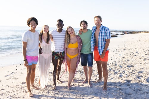 Preview: Diverse group of friends enjoy a sunny day at the beach