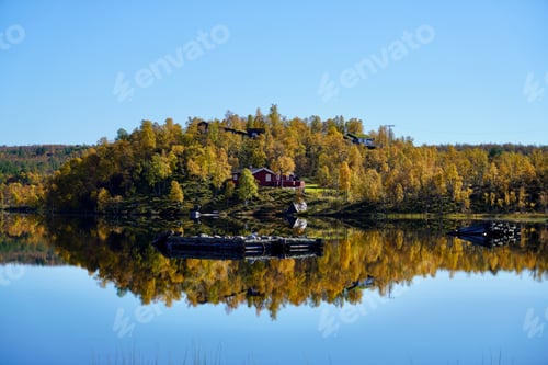 Preview: Norwegian mountain lake under a bright blue sky, north of the mining town of Roeros, Norway