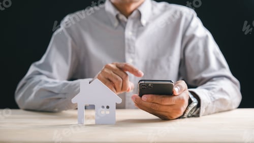 Preview: Man uses smart phone searching new home property online, finding real estate investment options