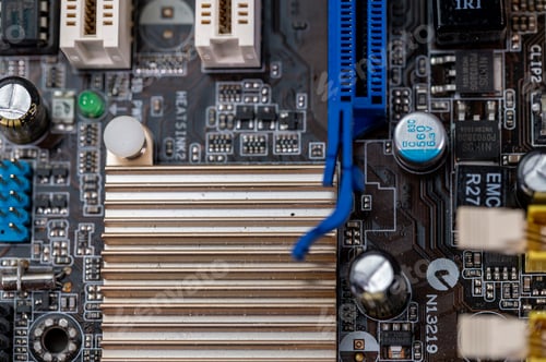 Preview: detail of a motherboard with connectors and heatsinks