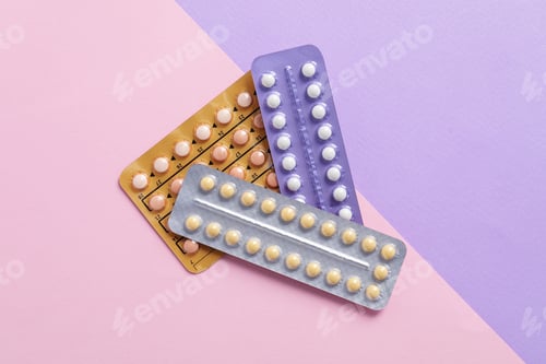 Preview: Blisters of contraceptive pills on color background, top view