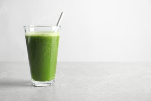 Preview: Glass with delicious detox juice on table