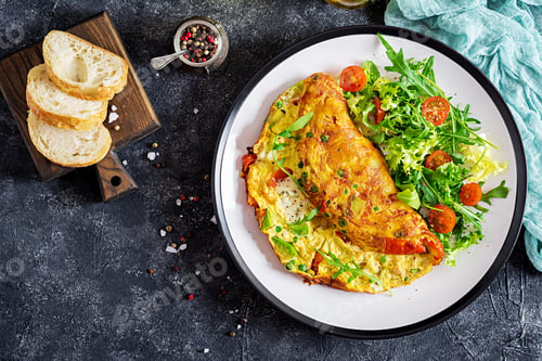 Preview: Breakfast. Omelette with tomatoes, avocado, blue cheese and green peas