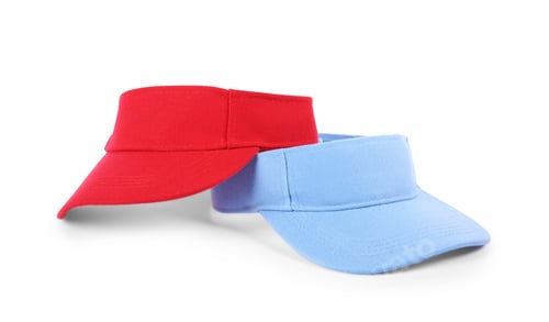 Preview: Red and light blue visor caps isolated on white. Mockup for design