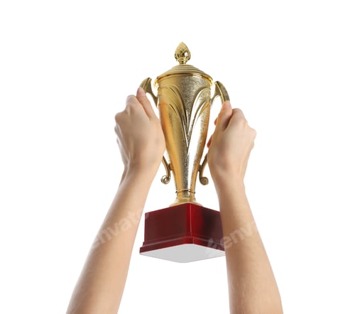 Preview: Woman holding gold trophy cup on white background, closeup