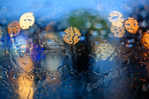 Preview: Raindrops with a blurry city lights
