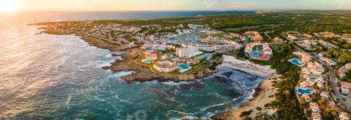 Preview: Aerial drone view of the harbor and the beach of Cala en Bosc, Menorca.