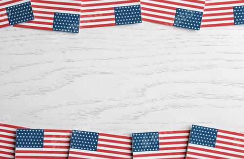 Preview: Flat lay composition of USA flags on wooden table, space for text. Happy Independence Day