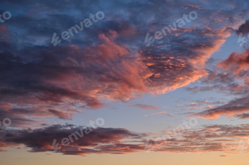 Preview: Dramatic pink sunset light clouds background
