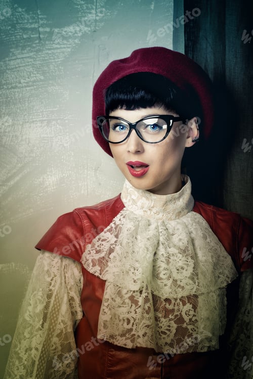 Preview: Portrait Of A Romantic Frenchwoman Beret, Vintage Dress And Wearing Glasses. The Concept Of Retro