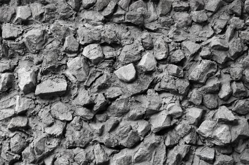 Preview: The texture of a strong stone wall of many concreted stones of various shapes