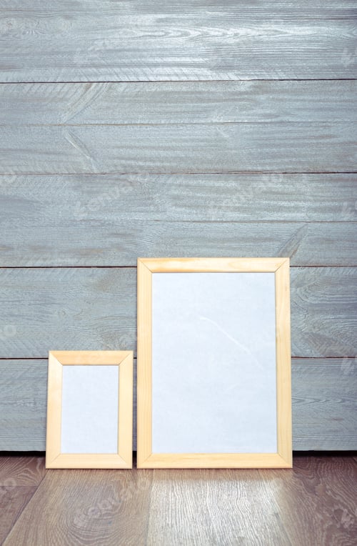 Preview: photo frames on the wooden wall