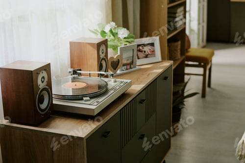 Preview: Playing Record on Vintage Turntable with Surrounding Decor